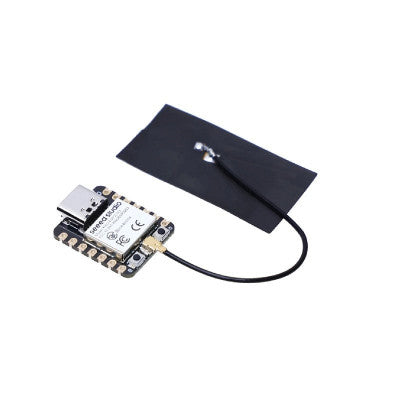 An Seeed Studio XIAO ESP32C3 tiny MCU board with Wi-Fi and BLE, battery charge supported, power efficiency and rich Interface