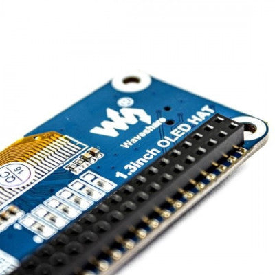An Waveshare 128x64 1.3inch OLED display HAT for Raspberry Pi